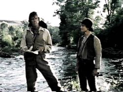 Gibb looks on as Luke hatches his Evil Scheme