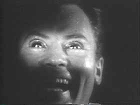 Actor John Agar suffers for his art.