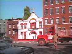 ...yet instead sees this church, and soon crosses (from the right side of the street to the other right side of the street) over to it.