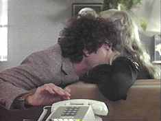 Sam’s ex-boyfriend makes out with her but can’t keep his hand off his phone. Comedy!