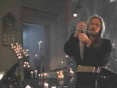 Religious fruitcake Street Preacher fondles his crucifix/knife. But hey, who hasnt?