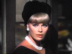 Elke Sommer is our thickly accented heroine, Kay.