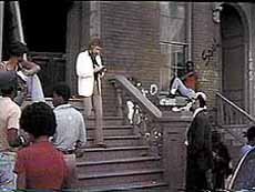 Ghetto Blacks are relieved to see a White Guy coming to help them.