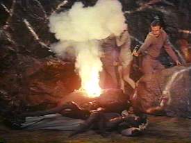 "Oh, boy, Larry caught us some dinner!  Hold still, Larry, while I cook it."