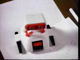 The toy robot...it's a metaphor...or symbolic...or some damn thing.