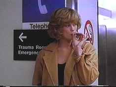 Our Heroine. Note her smoking, right in front of the No Smoking sign. You go, girl!