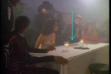 Photo Two:  Our cast sits at table, clearly sans signage...