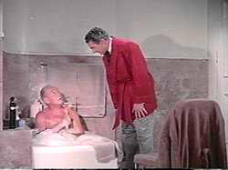 "For the tenth friggin' time, I can wash my own back!  Now get the heck out of here, would ya?!"