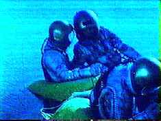 Two military life rafts provide comfortable room for four.