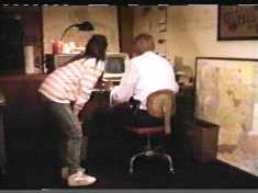 Bored with the movie, Stephanie and pal decide to play an early version of Scorched Earth instead.