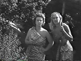 Ethel Merman and Robert Z'Dar watch the fighting with interest.